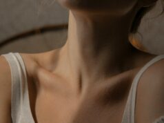 Close-up of woman's neck and collarbone.