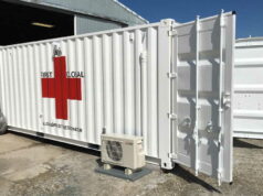 White medical aid shipping container with red cross